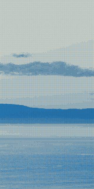 The bay and sea cliffs in the distance.